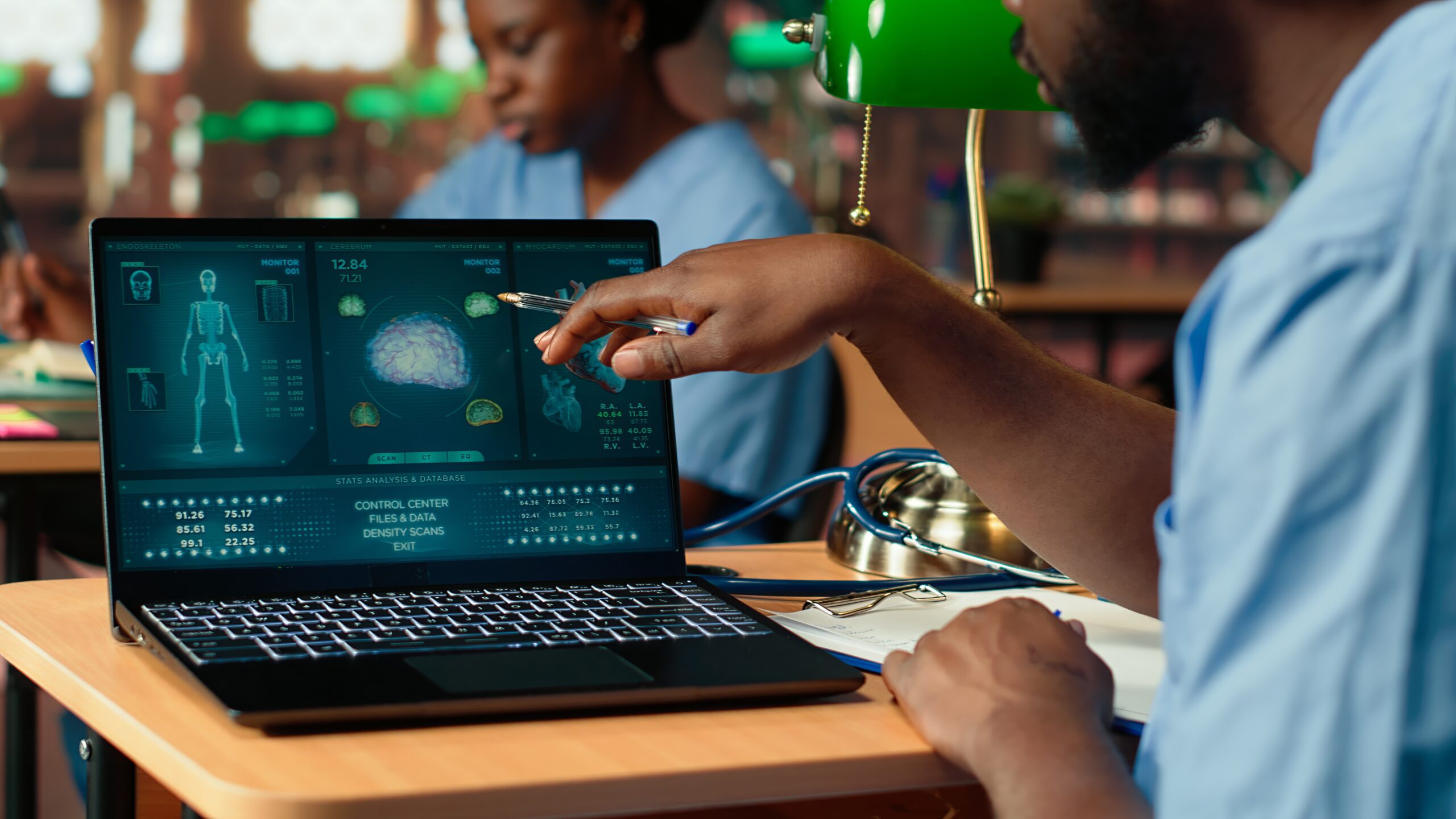 Black Med School Scholar Studying Taking Notes Using Online Information Scaled